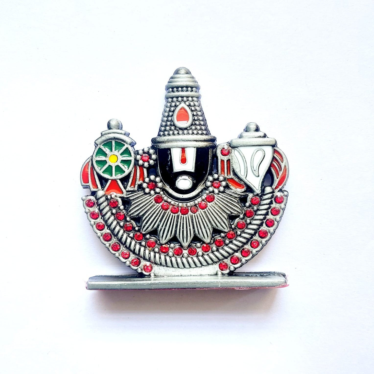 hand holding gada idol car dashboard (copy) hand holding gada idol car dashboard (copy)